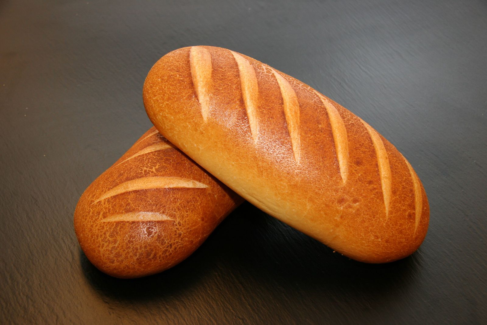 Flour-dusted artisan miche loaf